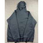 Back view of a charcoal gray Umbro hoodie from Second Half Supply Co, LLC featuring a drawstring hood and ribbed hem
