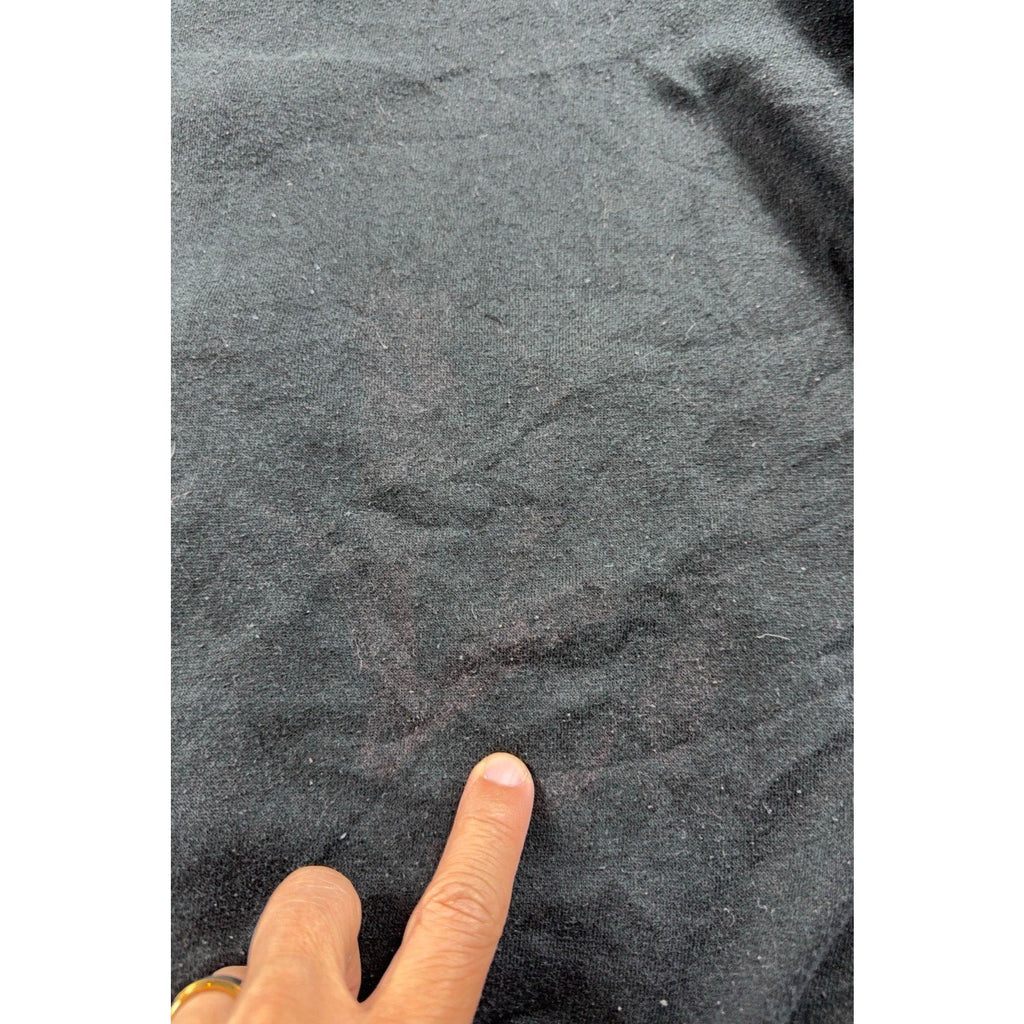 Second Half Supply Co, LLC Umbro hoodie showing a dark stain on the lower back fabric