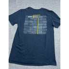 Second Half Supply Co, LLC black crewneck t-shirt featuring a Umi World Tour event schedule graphic on the back