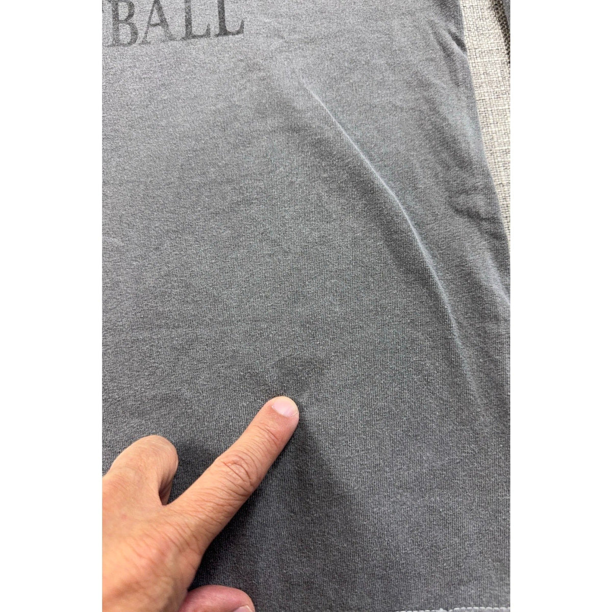 Second Half Supply Co, LLC charcoal gray Utah Utes Rose Bowl long sleeve shirt showing a diagonal fabric mark