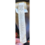 Second Half Supply Co, LLC Vans floral fanny pack polyester care label showing 100 percent polyester composition