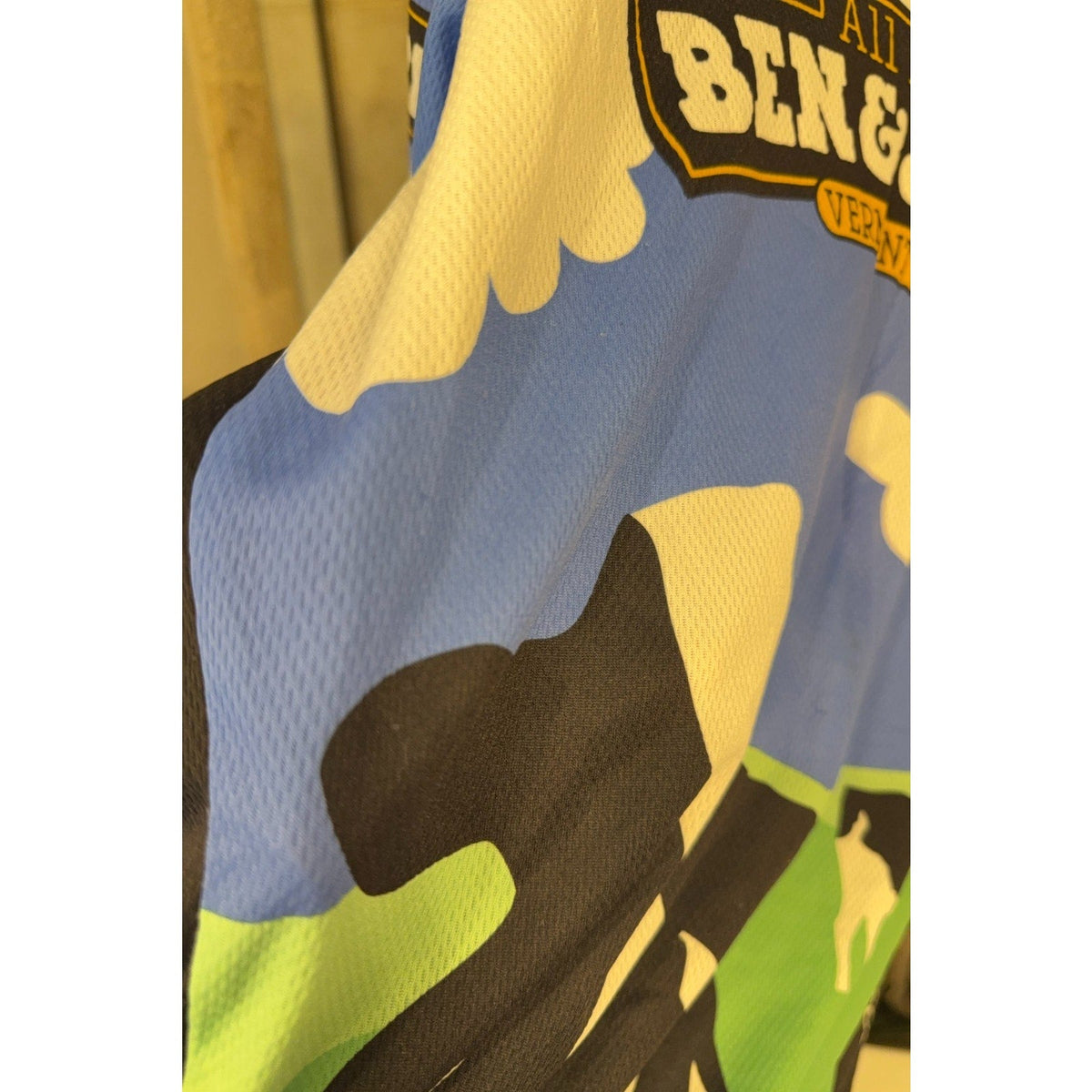 Second Half Supply Co, LLC vintage Pearl Izumi Ben & Jerry's cycling jersey featuring cow and cloud graphic print