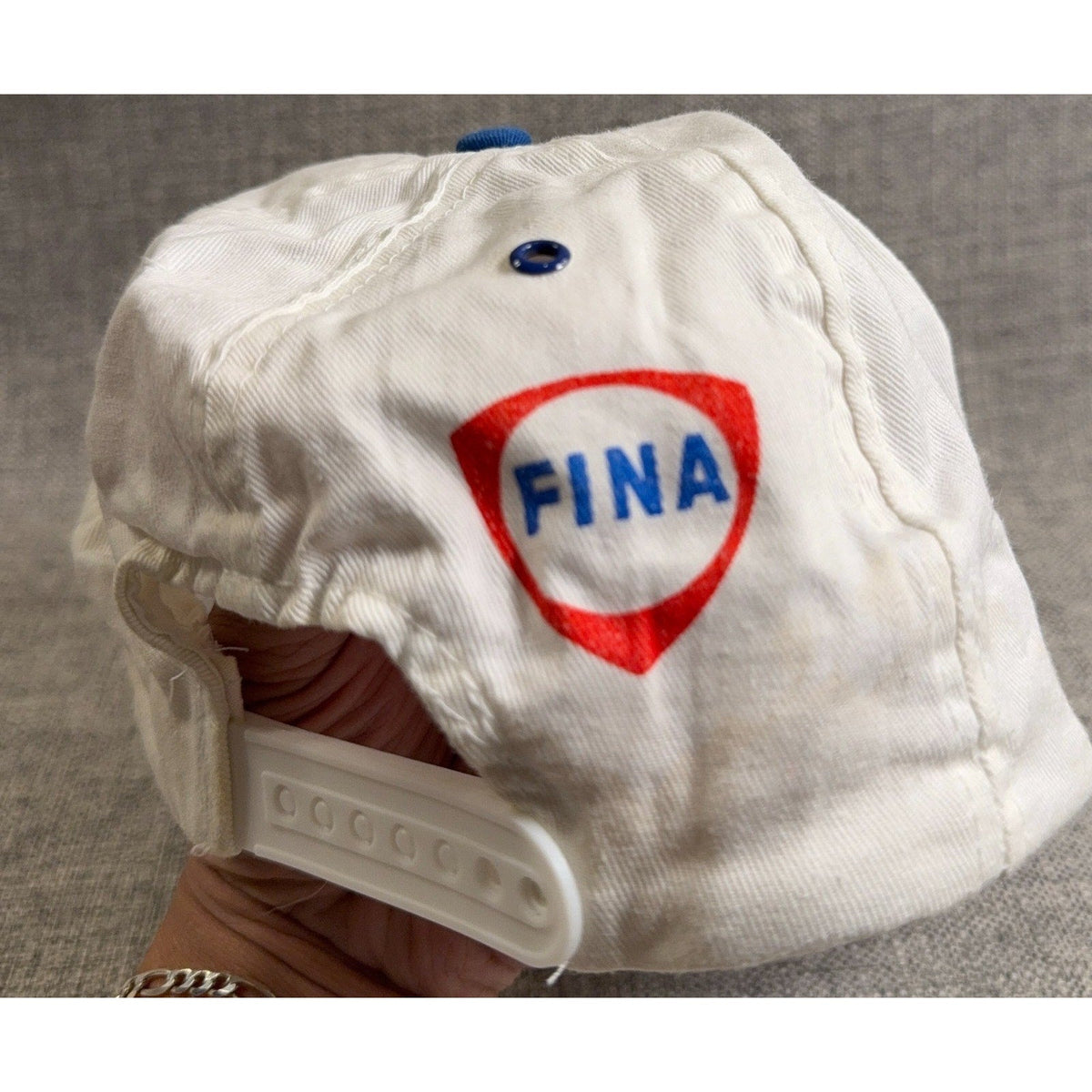 Second Half Supply Co, LLC vintage 1993 Texas Rangers FINA snapback hat with white fabric and blue eyelet detail.
