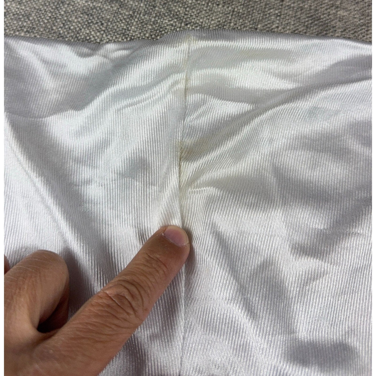 Second Half Supply Co, LLC vintage Dallas Cowboys jersey showing a small fabric stain on the white mesh material