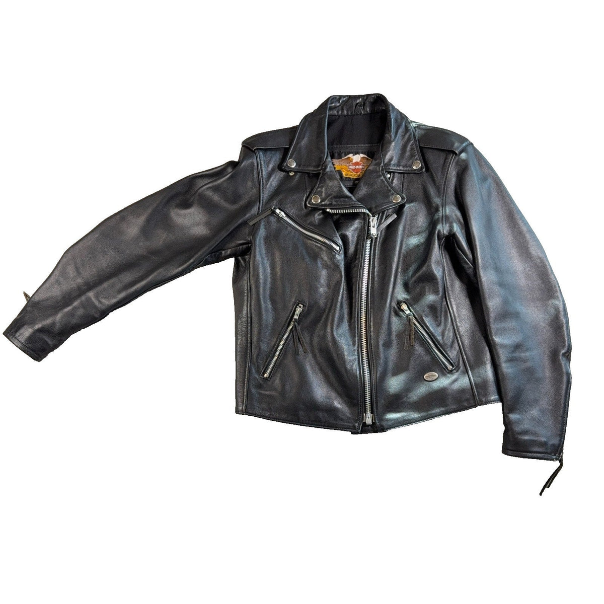 Second Half Supply Co, LLC vintage black leather Harley-Davidson motorcycle jacket with asymmetrical zipper and hardware