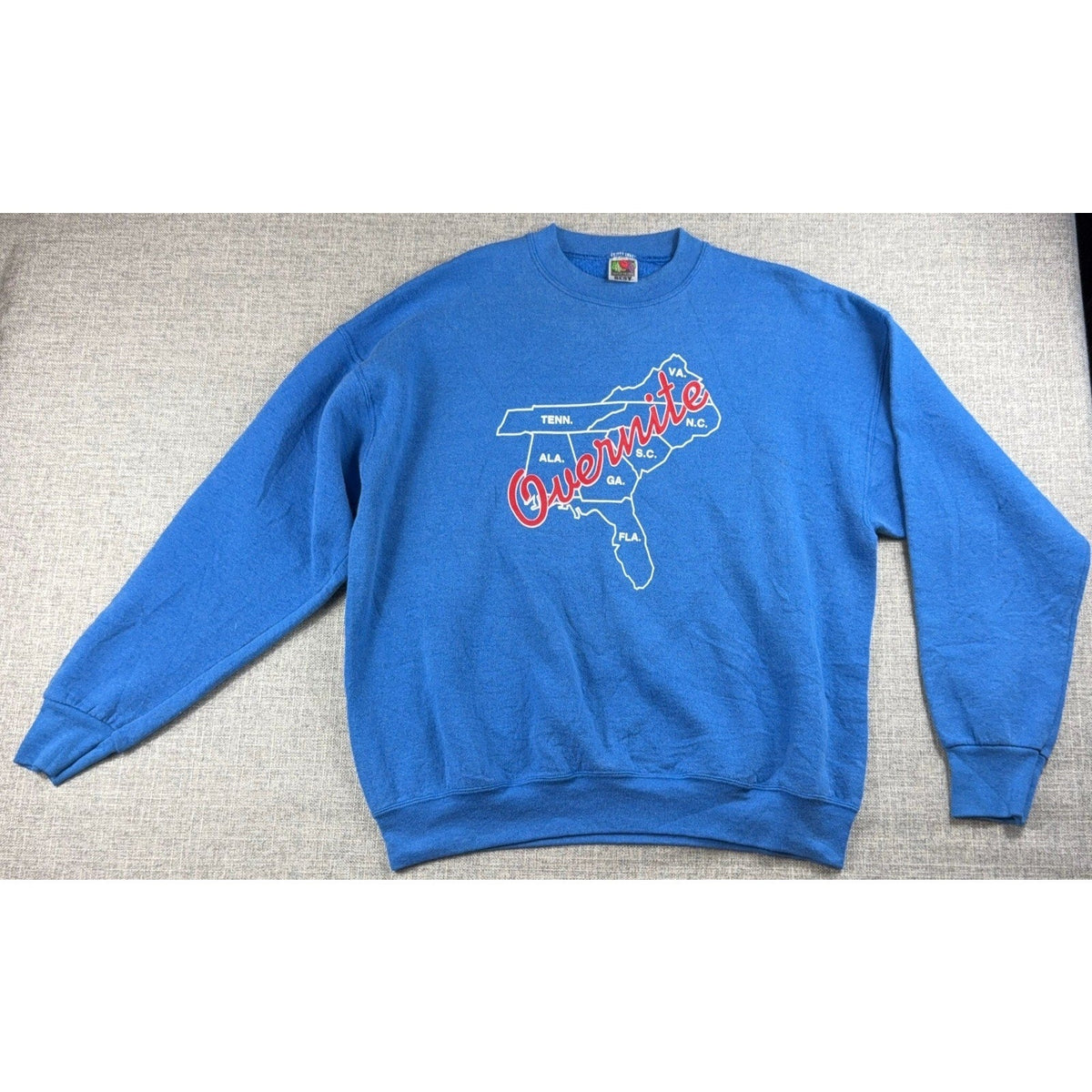 Second Half Supply Co, LLC vintage 90s royal blue Overnite Transportation crewneck sweatshirt with map graphic