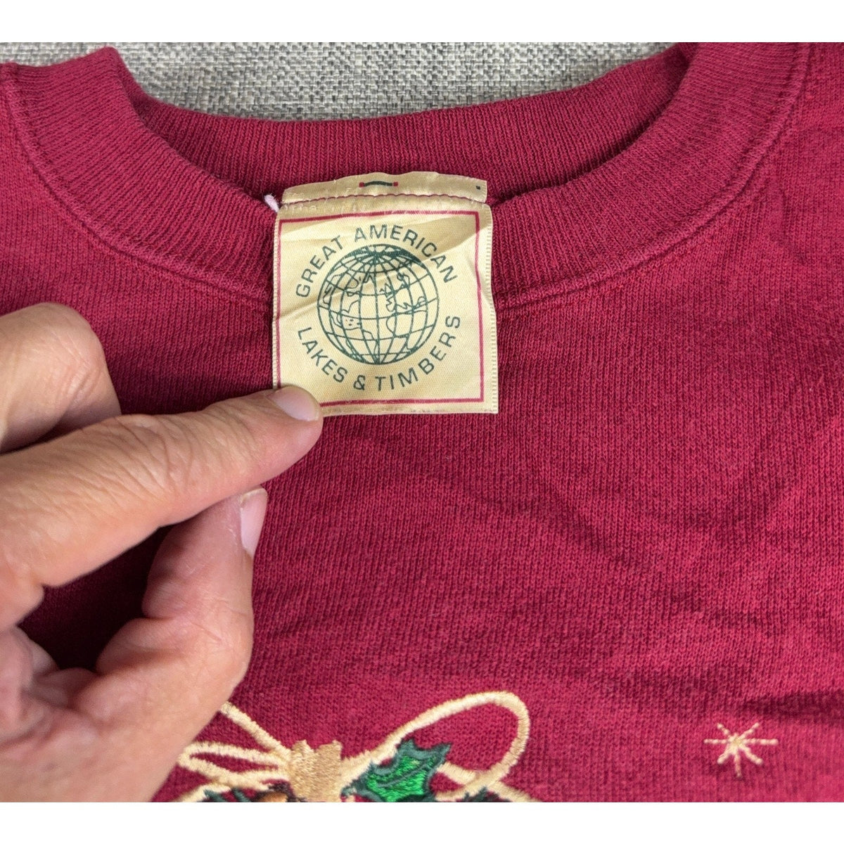 Second Half Supply Co, LLC vintage cranberry red sweatshirt with Great American Lakes & Timbers brand label