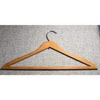 Second Half Supply Co, LLC vintage wooden clothes hanger from the historic Rice Hotel Houston with a metal hook