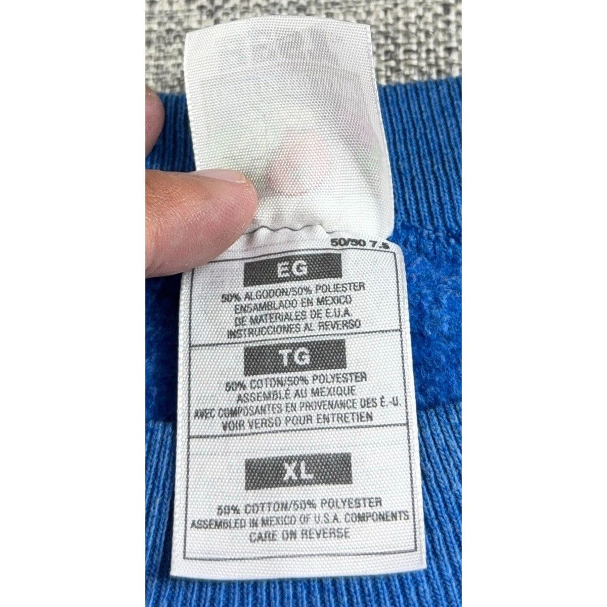 Second Half Supply Co, LLC vintage 90s sweatshirt Fruit of the Loom 50/50 cotton polyester blend fabric care tag