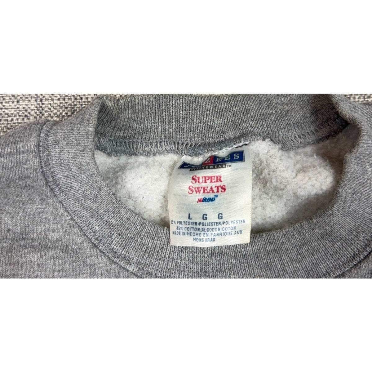 Second Half Supply Co, LLC vintage gray sweatshirt interior neck label with Jerzees Super Sweats branding