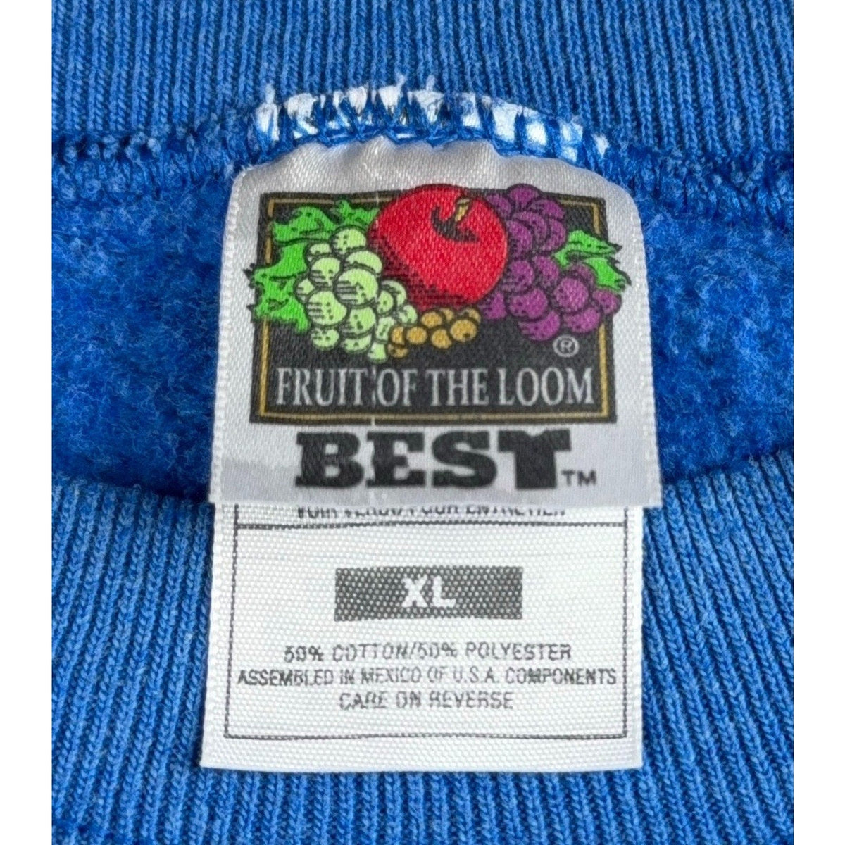 Second Half Supply Co, LLC vintage Fruit of the Loom Best XL sweatshirt tag in heathered royal blue fabric