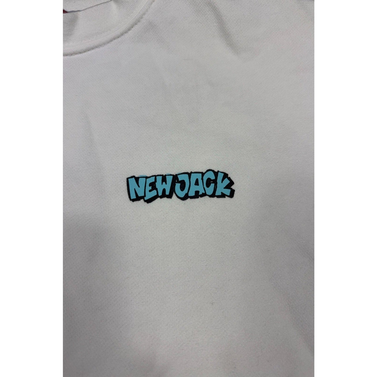 Second Half Supply Co, LLC white crewneck sweatshirt featuring a small turquoise New Jack logo on the chest