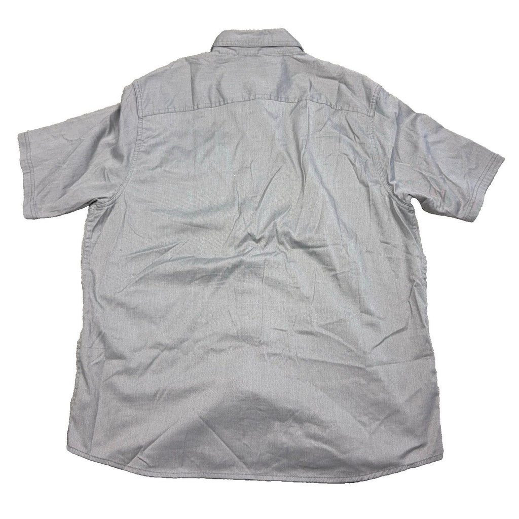 Back view of a gray Wrangler short sleeve button-up shirt with a curved hem from Second Half Supply Co, LLC.