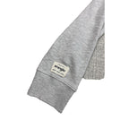 Second Half Supply Co, LLC heather gray Wrangler sweatshirt sleeve with ribbed cuff and branded fabric patch