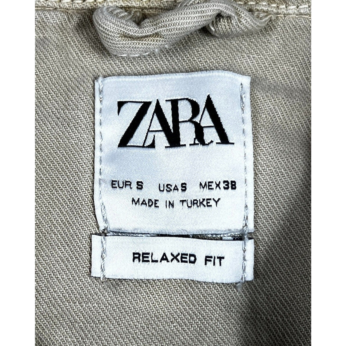 Second Half Supply Co, LLC Zara men's relaxed fit shirt size small clothing tag on khaki twill fabric