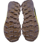 Second Half Supply Co, LLC Saucony Koa ST trail running shoes showing worn rubber outsoles with deep traction lugs